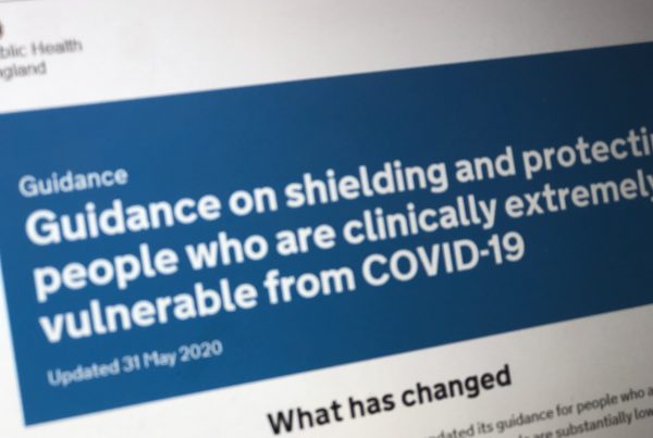 Photo of computer screen displaying a gov.uk page with the title Guidance and shielding and protecting people who are clinically extremely vulnerable from COVID-19.